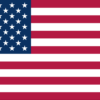 アメリカ合衆国の国旗（星条旗）。13本の縞と50の星が描かれた、自由と統合を象徴する歴史的シンボル。